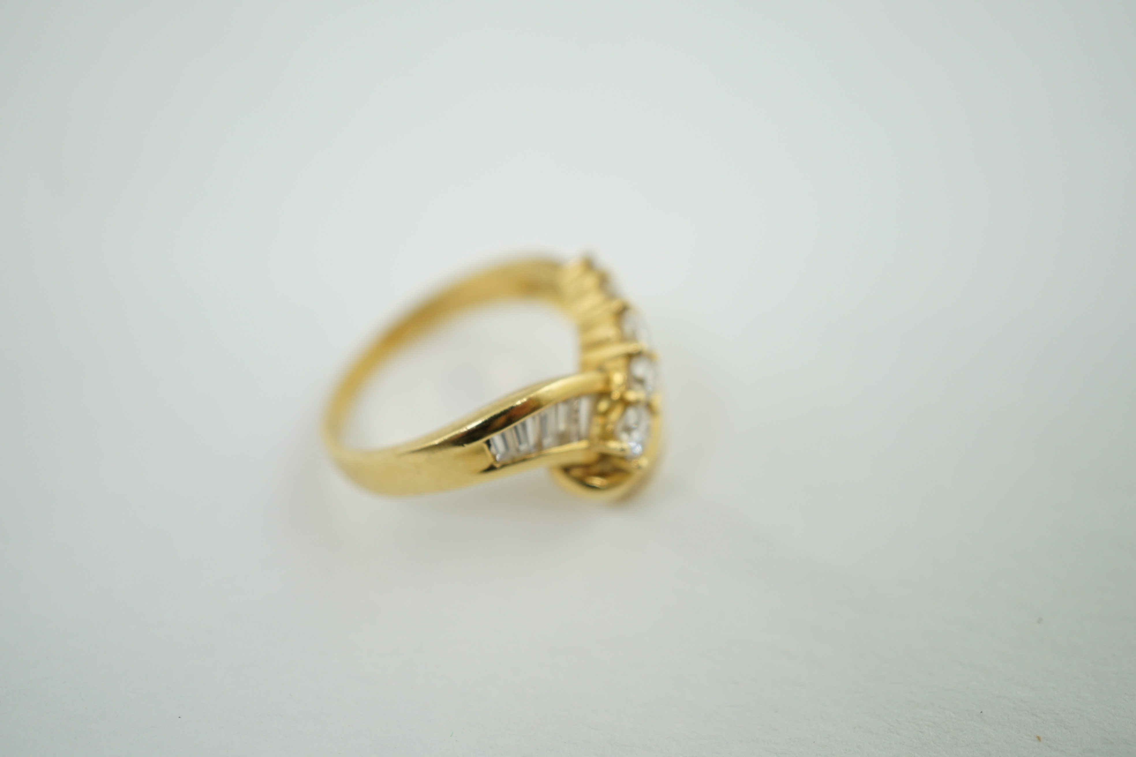 An 18k gold and diamond dress ring